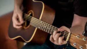 Playing guitar
